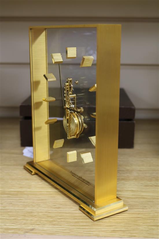 A Jaeger le Coultre, Geneve mantel clock with case and paperwork H.19.5